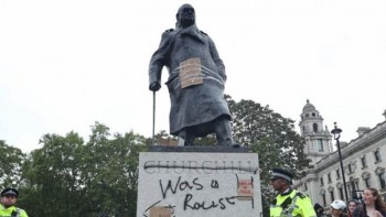 Protests risk to Churchill statue shameful - British PM
