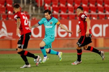 Messi caps Barcelona make an impression on Mallorca on La Liga return