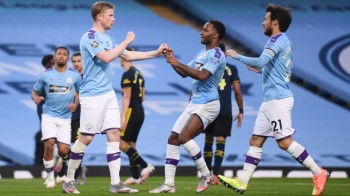 City outclass Arsenal on first day back
