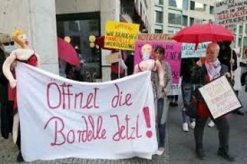 Sex workers protest above shuttered Berlin brothels