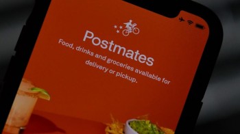 Uber buys US delivery startup Postmates to add to its Uber Eats business