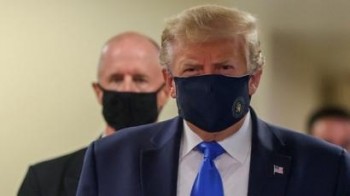 Donald Trump finally wears facemask in public areas