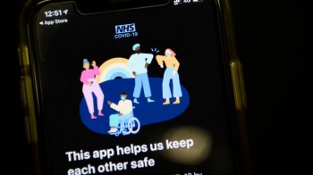 Four months behind schedule, virus app launched in England and Wales