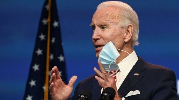 Biden warns 'more people may die' of Covid if transition delayed