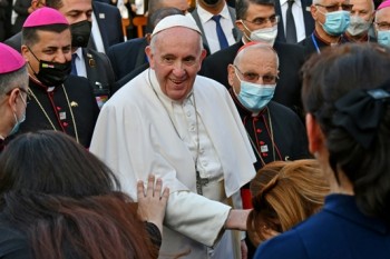 Pope Francis visits Iraqi Christians who have suffered under IS