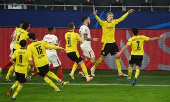 Haaland goals mail Dortmund former Sevilla into Champions League last eight