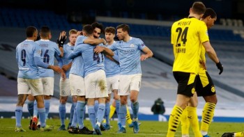 Foden's late winner helps City edge Dortmund