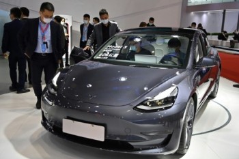 Tesla to build info center in China after backlash, spying fears