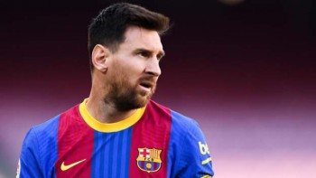 Messi agrees Barca stay on reduced wages