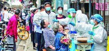 Two more parts of China report Covid outbreaks