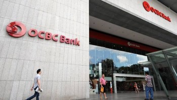 Singapore banks report strong profit growth, loan losses decline