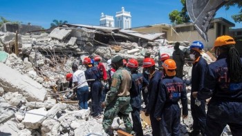 Haiti quake deaths soar as storm approaches