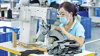 China’s economy under pressure as factory activity slows