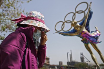 China keeps virus at bay at high cost ahead of Winter Olympics