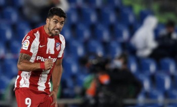 Suarez fires Atletico top with late double at Getafe