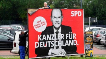 Pledging stability, German SPD seeks three-way alliance to succeed Merkel