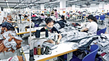 Vietnam’s lockdown ensnares world’s clothing giants