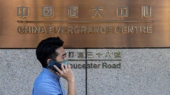 Evergrande shares fall 14% as trading resumes in Hong Kong