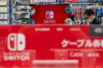 Nintendo hikes profit forecast despite gaming boom slowdown