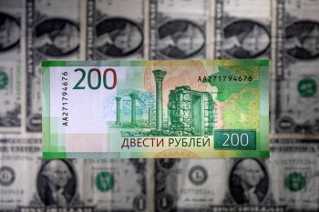 Russia pays bondholders in roubles after US blocks dollar payments