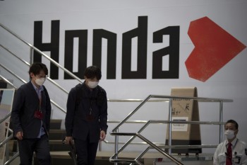 Honda's profit slides on chips, material cost woes