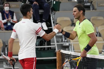 Rafael Nadal and Novak Djokovic set for late-night showdown in French Open
