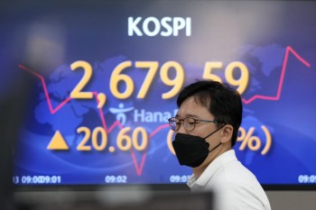 Asian shares rise; China trading closed for national holiday