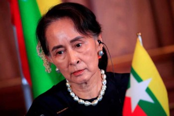 Myanmar court jails Suu Kyi, Australian economist for 3 years