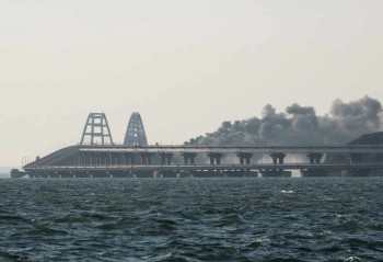 Blast hits Crimea bridge crucial to Russia's war