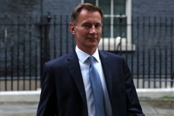 New UK finance minister tears up tottering PM's agenda
