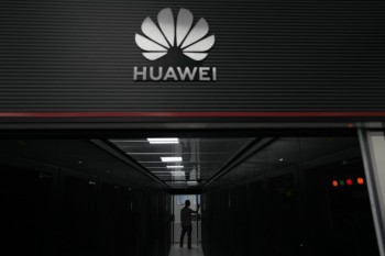 Huawei says it's out of 'crisis mode,' though revenue flat