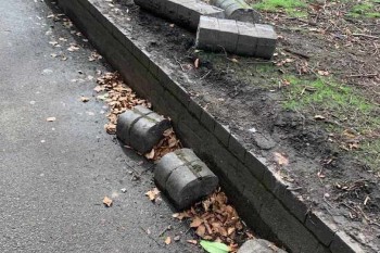 Claims fallen bricks from wall are 'danger' to residents