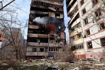 Russian drones, missiles hit Ukraine apartments and dorm, killing civilians