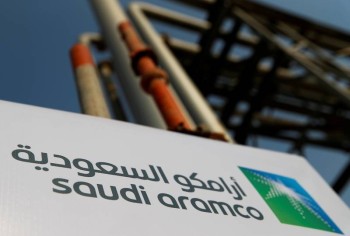 Saudi Aramco profit slides to $30 billion on lower oil prices